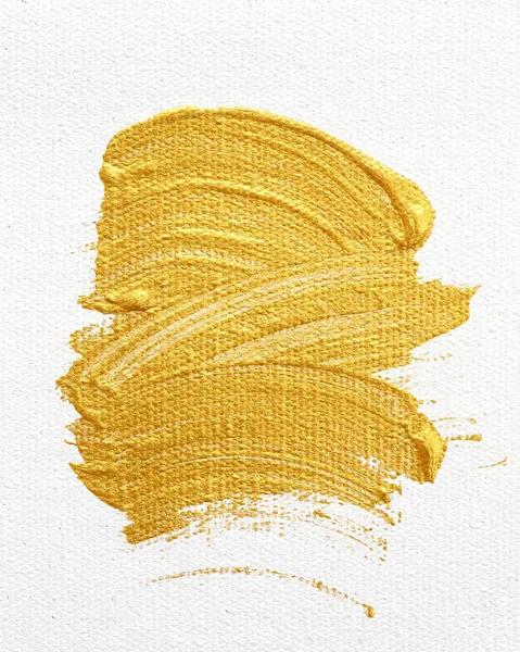 Pinselstriche aus Gold Acrylfarbe isoliert auf weißem Hintergrund — Stockfoto