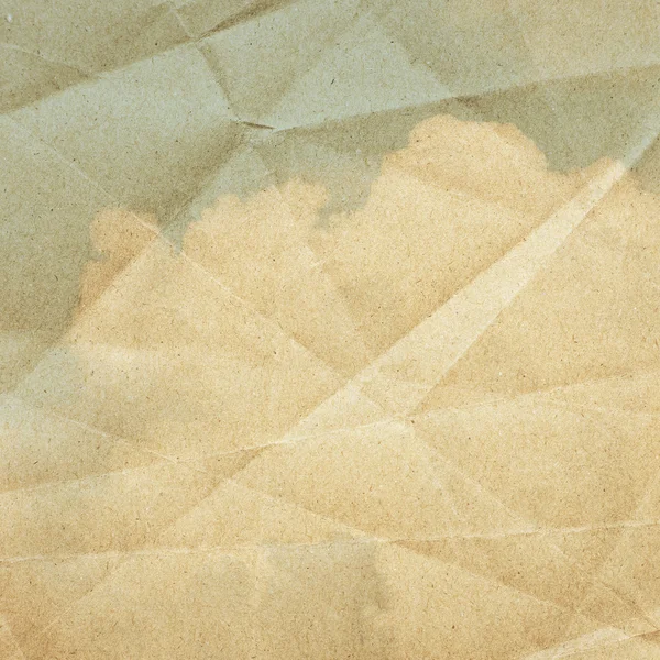 Nuvens céu em um fundo de papel texturizado, vintage — Fotografia de Stock