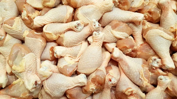 Fresh chicken legs in the market