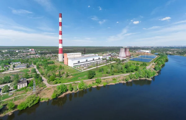 Panorama of power plant with pipes on lake in summer — Stock Photo, Image