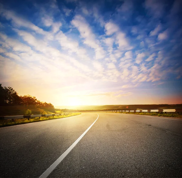 Evening landscape with a road — Stock Photo, Image