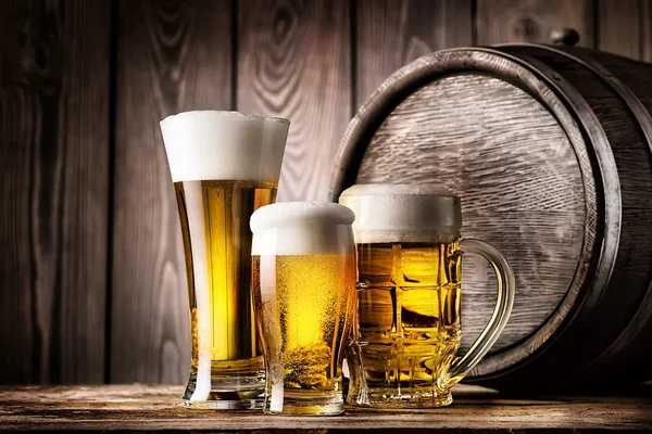 Two glasses and mug of light beer — Stock Photo, Image