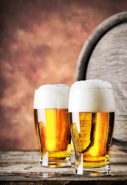 Two glasses of light beer — Stock Photo, Image