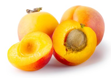 Whole and cut apricots with leaves