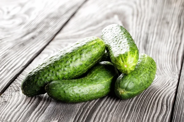 Bunch of ripe green cucumbers — Stock Fotó