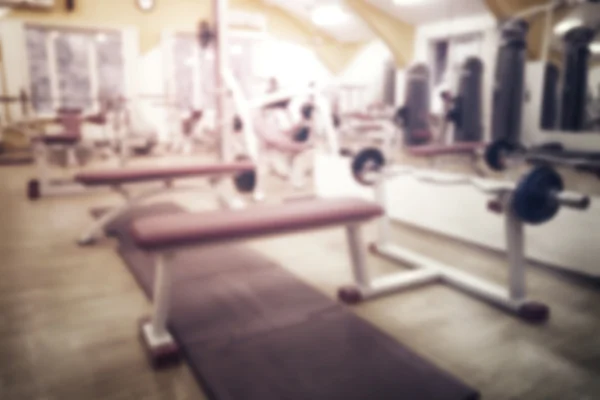 Stoisko Barbellon w siłowni strzał z blur — Zdjęcie stockowe