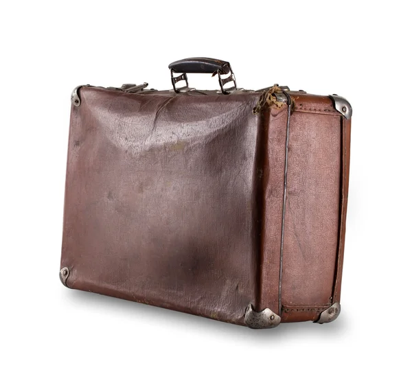 Stående vid en vinkel misshandlade resväska — Stockfoto