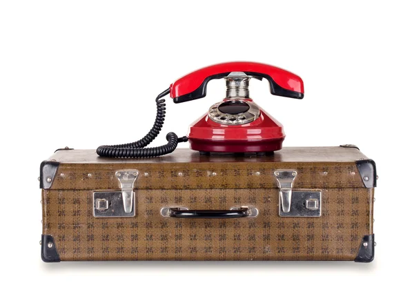 Czerwony stary telefon i walizki — Zdjęcie stockowe