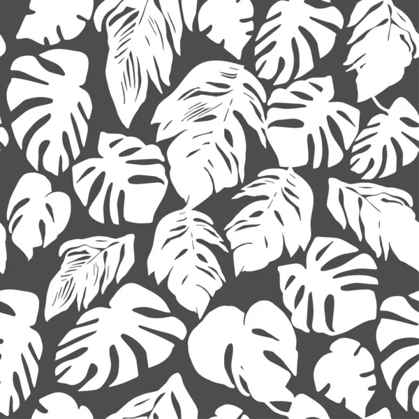 Monochroom naadloos patroon met silhouetten van tropische bladeren op zwart. — Stockvector