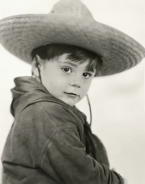 Rapaz e o seu sombrero Imagem De Stock