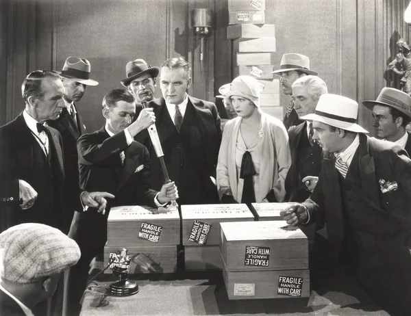 Men unpacking boxes — Stock Photo, Image