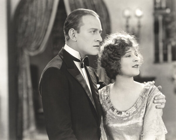 Distracted couple  looking away