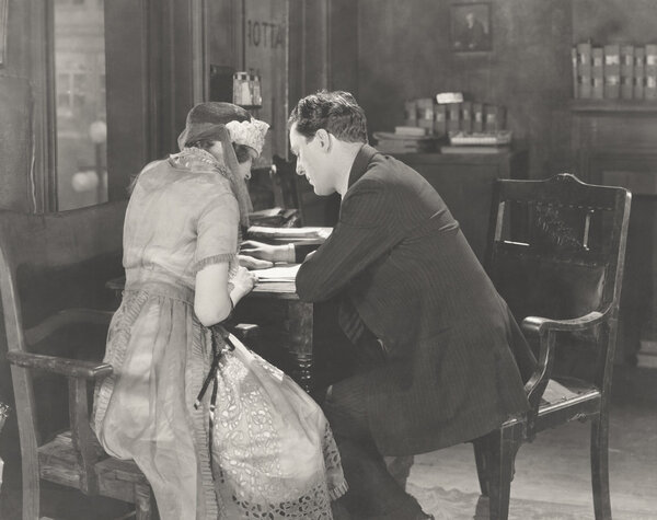 woman Signing papers