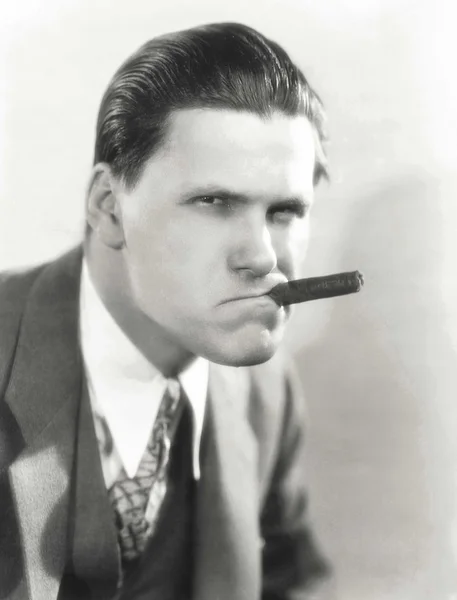 Man Smoking a cigar with attitude — Stock Photo, Image