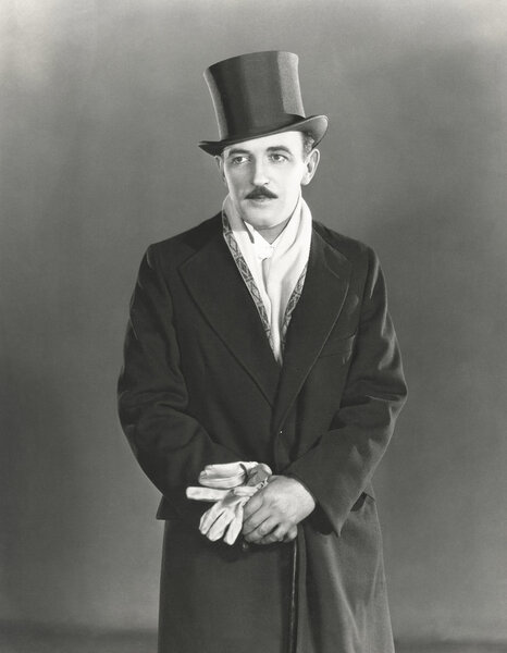 man with stick stepping out
