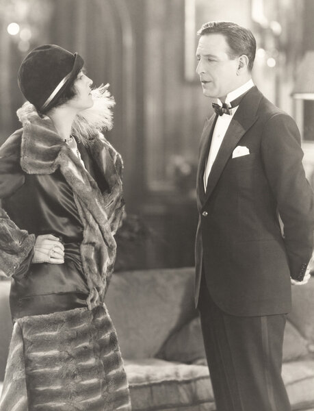 man and woman talking