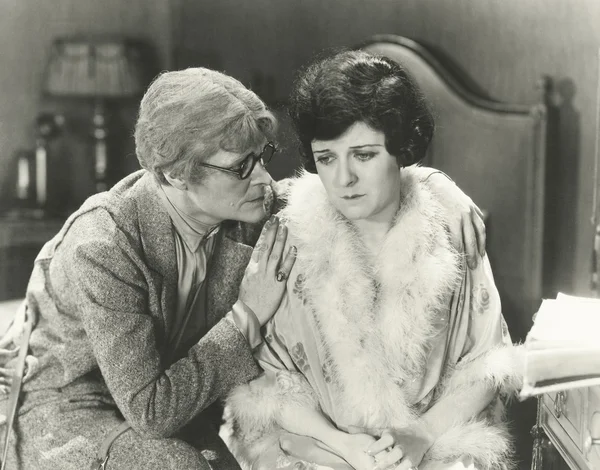 Woman Consoling a friend Stock Image