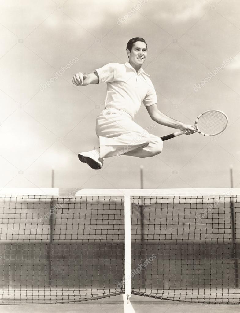 young man playing tennis