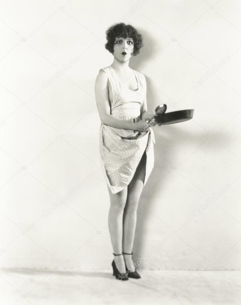 Woman holding pan