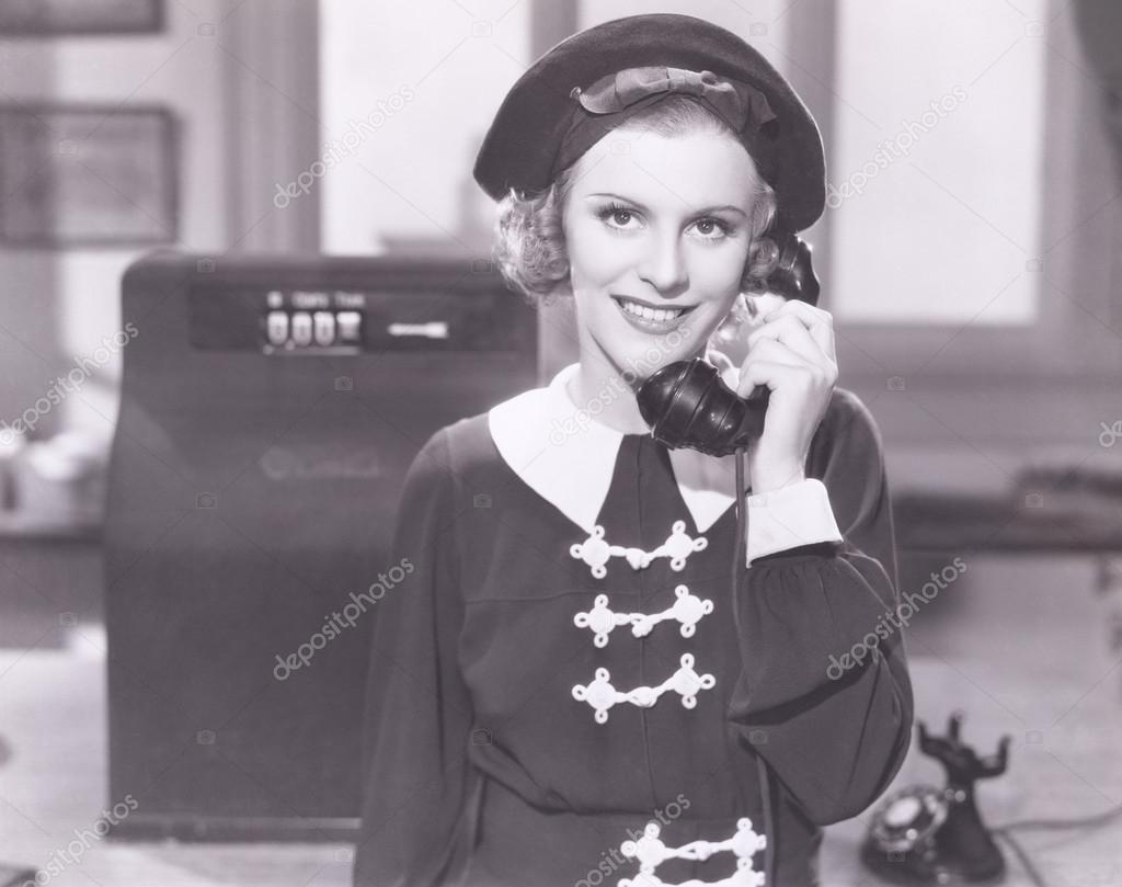 Smiling woman on the telephone