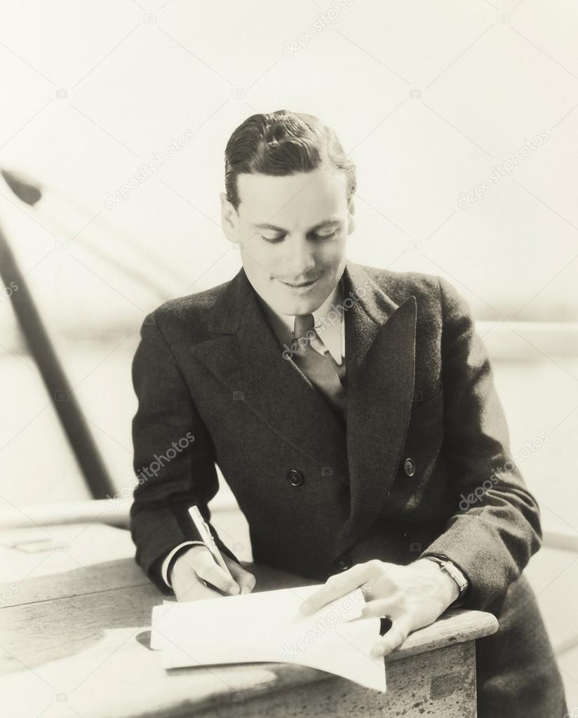 Man signing a contract