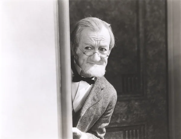 Senior man Listening in — Stock Photo, Image