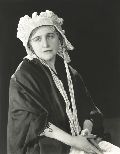 woman in bonnet posing