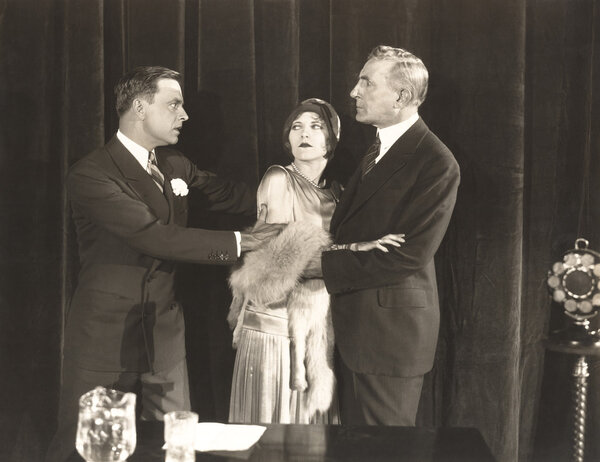 father protecting young woman