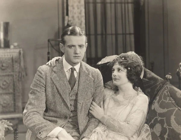 Man and woman sitting — Stock Photo, Image