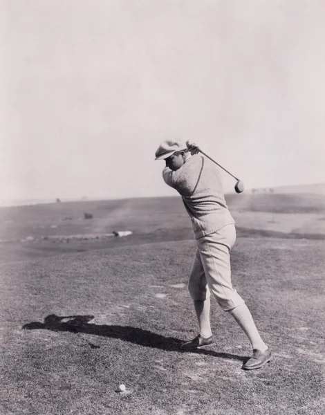 Man Taking a swing at it — Stock Photo, Image