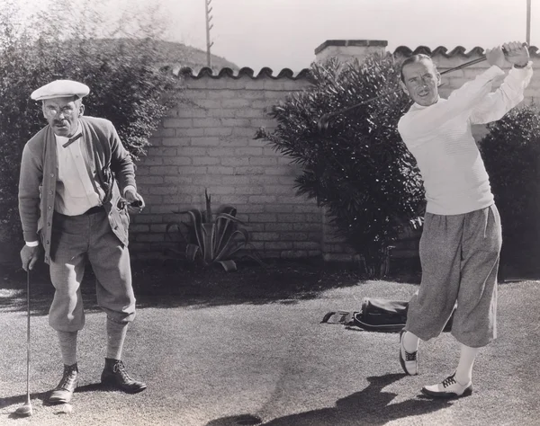 Men playing golf — Stock Photo, Image