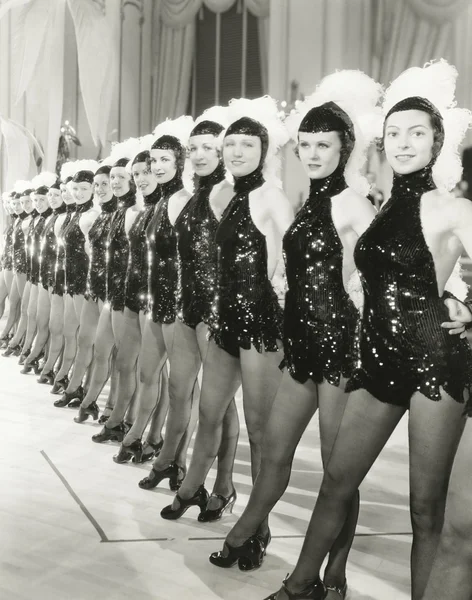 A row of chorus girls Stock Picture
