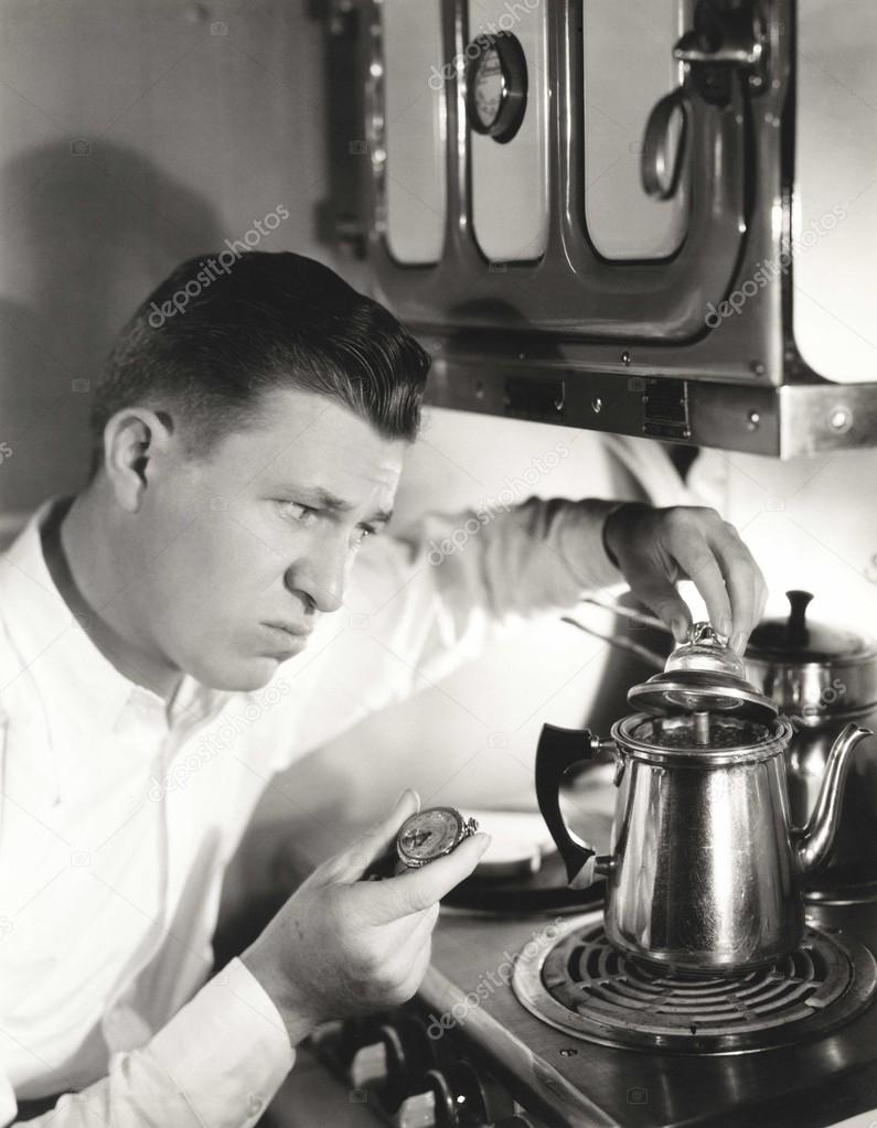 young man preparing coffee