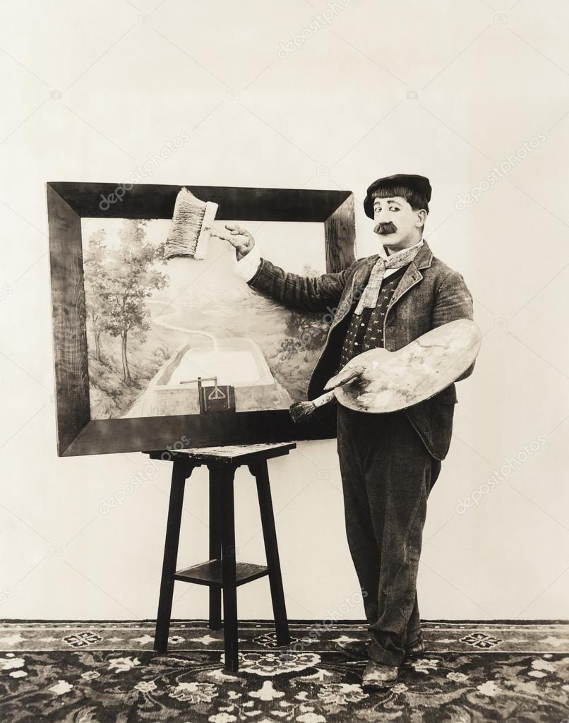 Painter holding brush