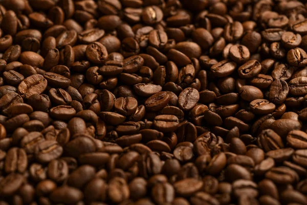 Pile of dark roasted coffee beans — Stock Photo, Image