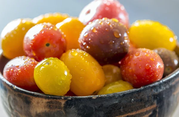 Cherry tomatos in bowl — Stock Photo, Image