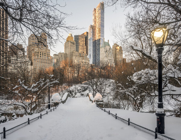 Gapstow Bridge is one of the icons of Central Park, Manhattan in New York City after snow storm