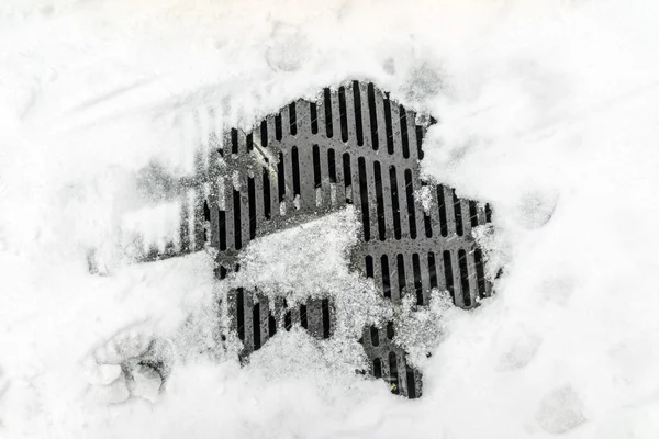 Sewer cover snow — Stock Photo, Image
