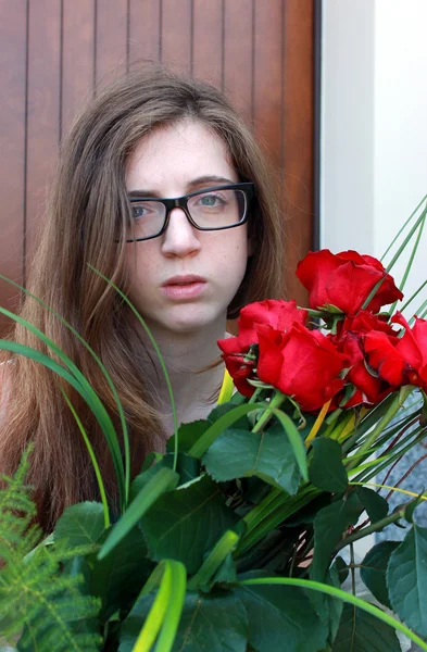 Girl with red roses — Stock Photo, Image