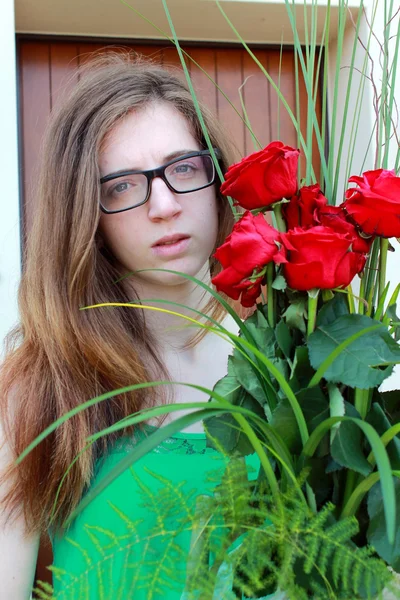 Girl with red roses — Stock Photo, Image