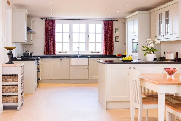 Painted wood shaker style kitchen interior design, UK luxury kitchens