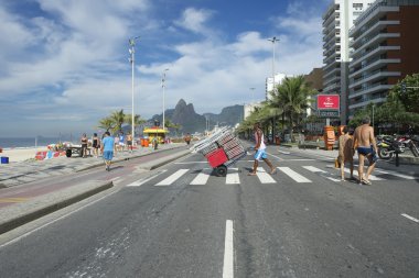 Brazilian Man Pulling Beach Chairs Rio Brazil