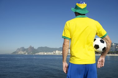 Brazilian in Team Brazil Kit Standing with Football Rio