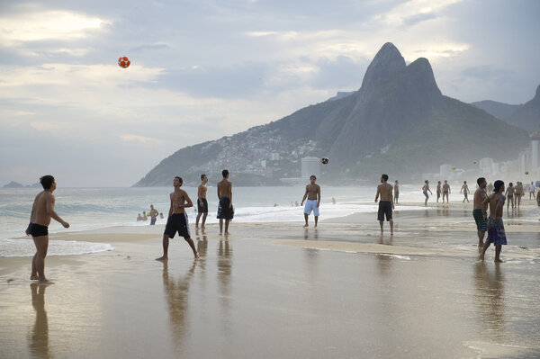 Group of Brazilians Playing Altinho Futebol Beach Football
