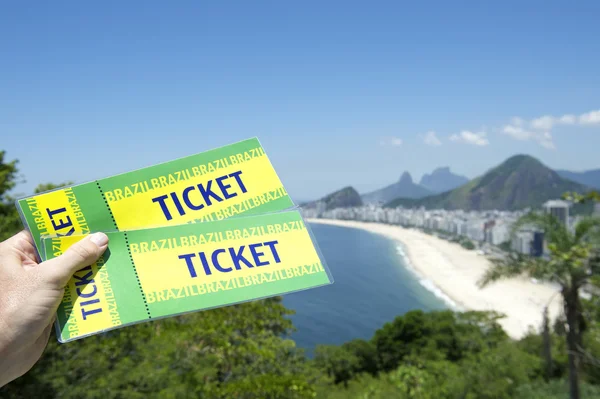 Hand Holding Brazil Tickets Rio Beach — ストック写真