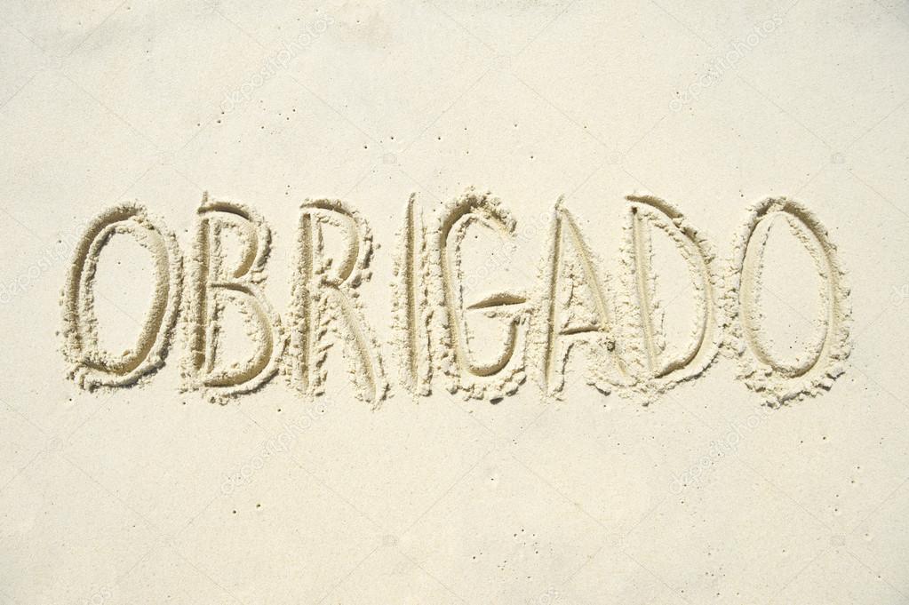 Obrigado Thank You Message in Sand