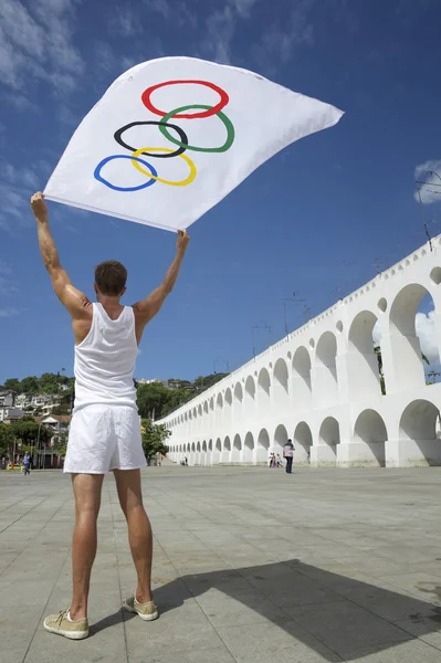 Atleta con bandera olímpica Río de Janeiro Fotos de stock libres de derechos
