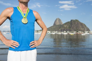 Gold Medal Athlete Standing at Botafogo Beach Rio
