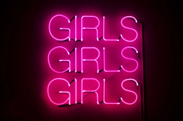 Mädchen Mädchen Mädchen unterschreiben in rosa Neon — Stockfoto