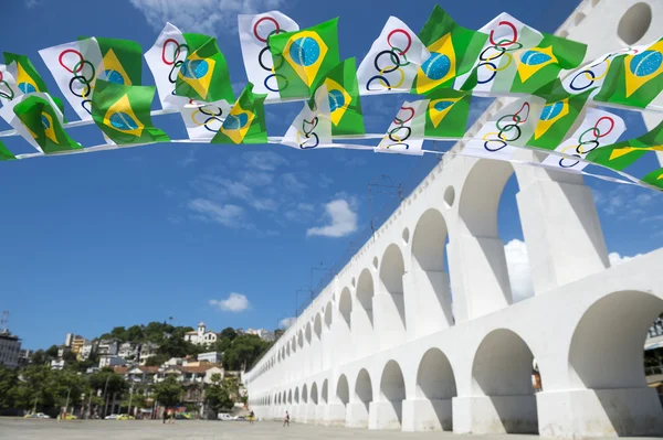 Olympic and Brazilian Flags Lapa Arches Rio ストック画像